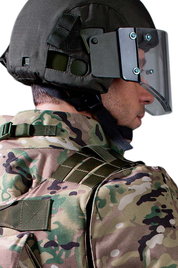 Military in a black helmet with a thick glass visor