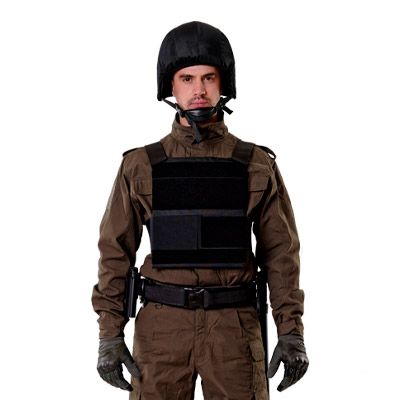 Black bulletproof vest Plitnik on a man in a helmet, full-face view from the knees