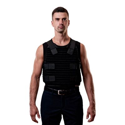 Black bulletproof vest on a man full face view from the knees