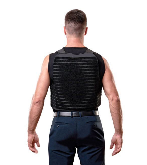 Black bullet-proof vest on a man from behind the knees
